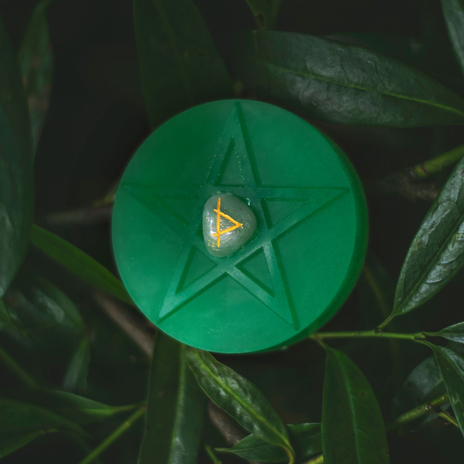 Scenic View Of The Naturally Wicked Fortune Soap For The Explorer With Aventurine Crystal On Green Leafy Background
